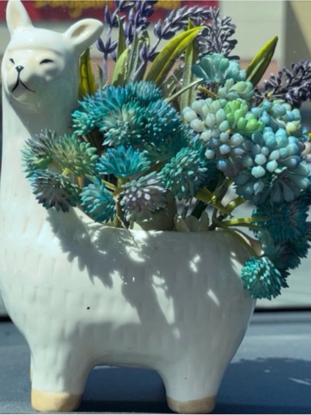 White Ceramic Llama Planter with Teal and Aqua Faux Flowers